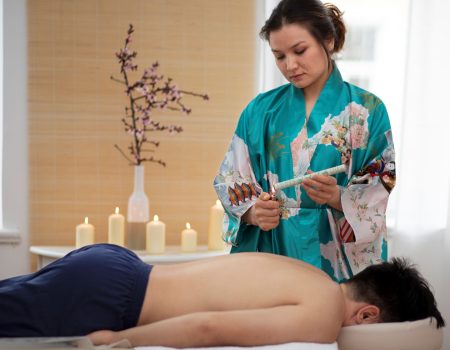 medium-shot-woman-lighting-up-stick